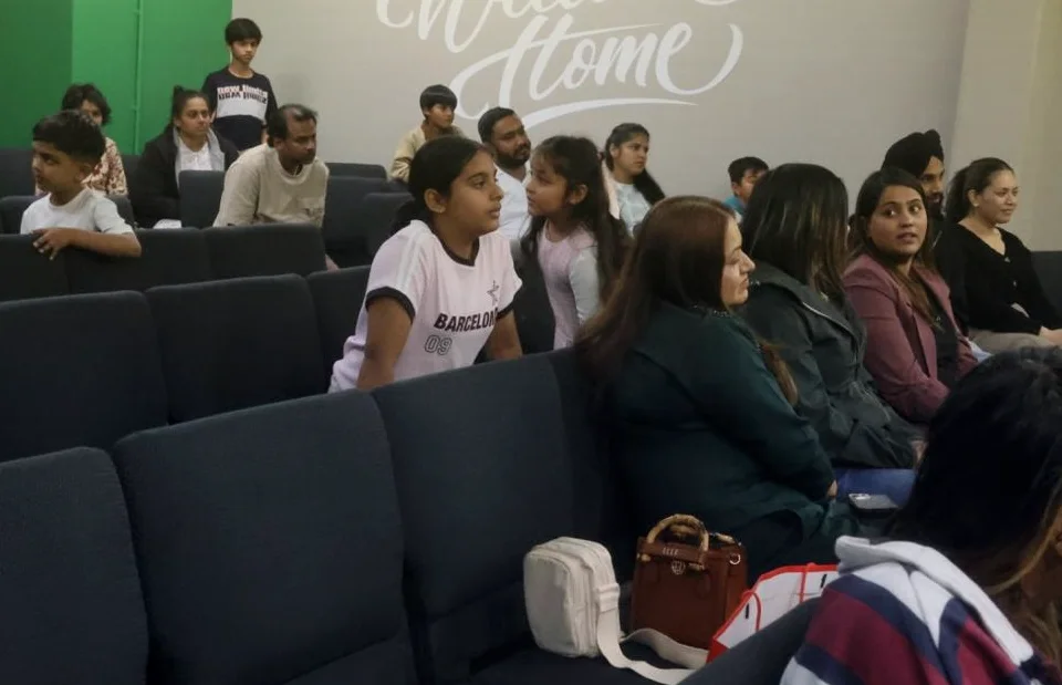 The congregation seated together before a service begins