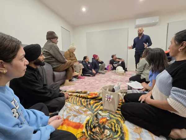 Members of the church gathered in a home for fellowship