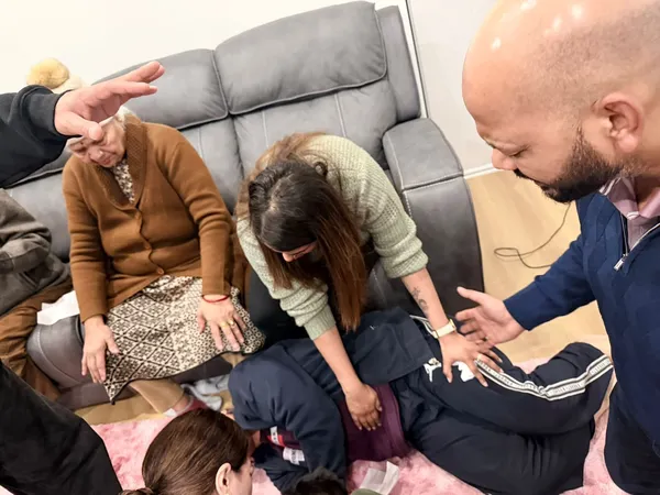 Praying together during a home gathering