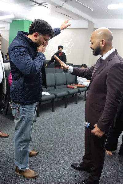Praying with one another after the service