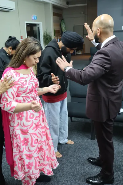 Praying together as a church family
