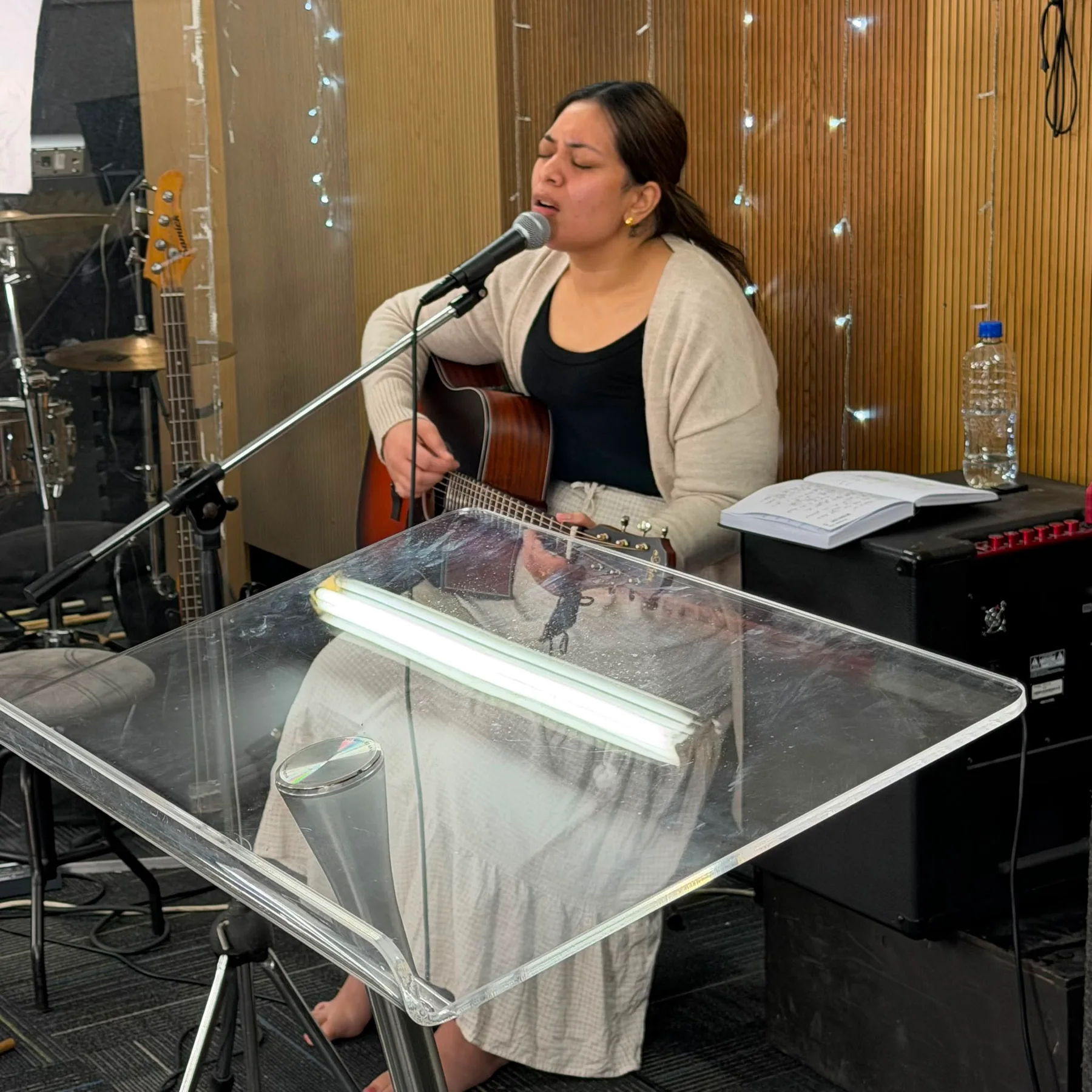 Voices lifted together in Sunday worship.